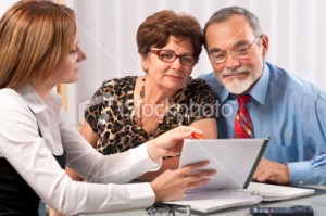 Elderly Couple Examining a Contract
