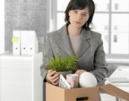 Wrongful Dismissal -- Woman packing her belongings