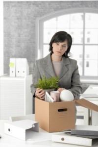 Wrongful Dismissal -- Woman packing her belongings