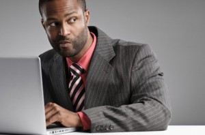 Non-Competition Clauses Man on Computer