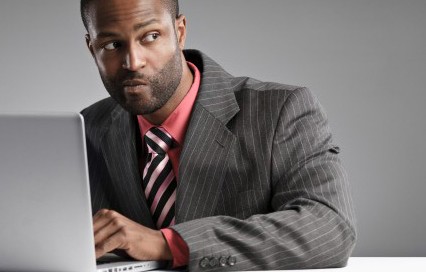 Non-Competition Clauses Man on Computer