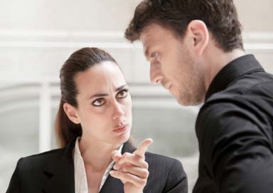 Verbal Threat Workplace Violence and Termination -- Woman scolding a man